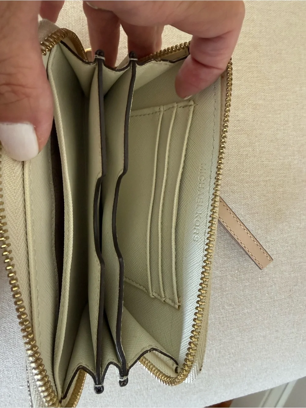 Michael Kors Cream Logo Wristlet with Gold Plate
